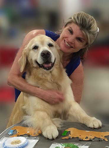 dog breeder and show dog website designer jennifer workman and her golden retriever kim